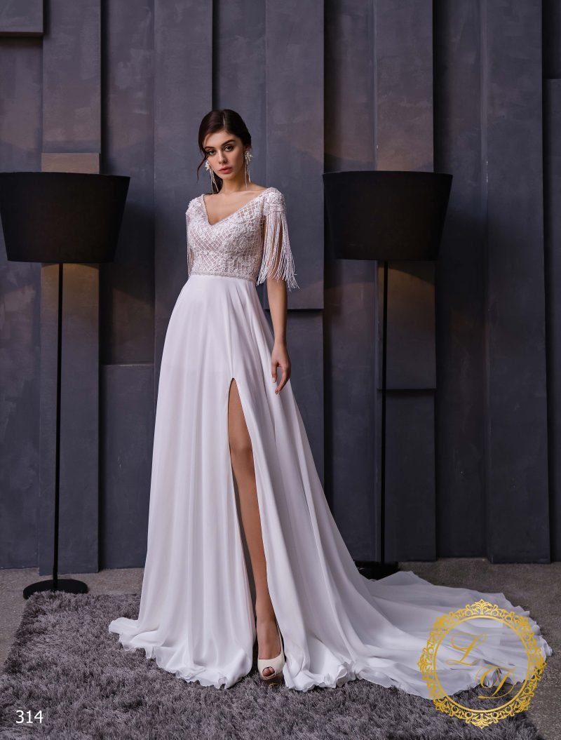 Robe De Mariée Fendue Manches Courtes A Franges Perlées