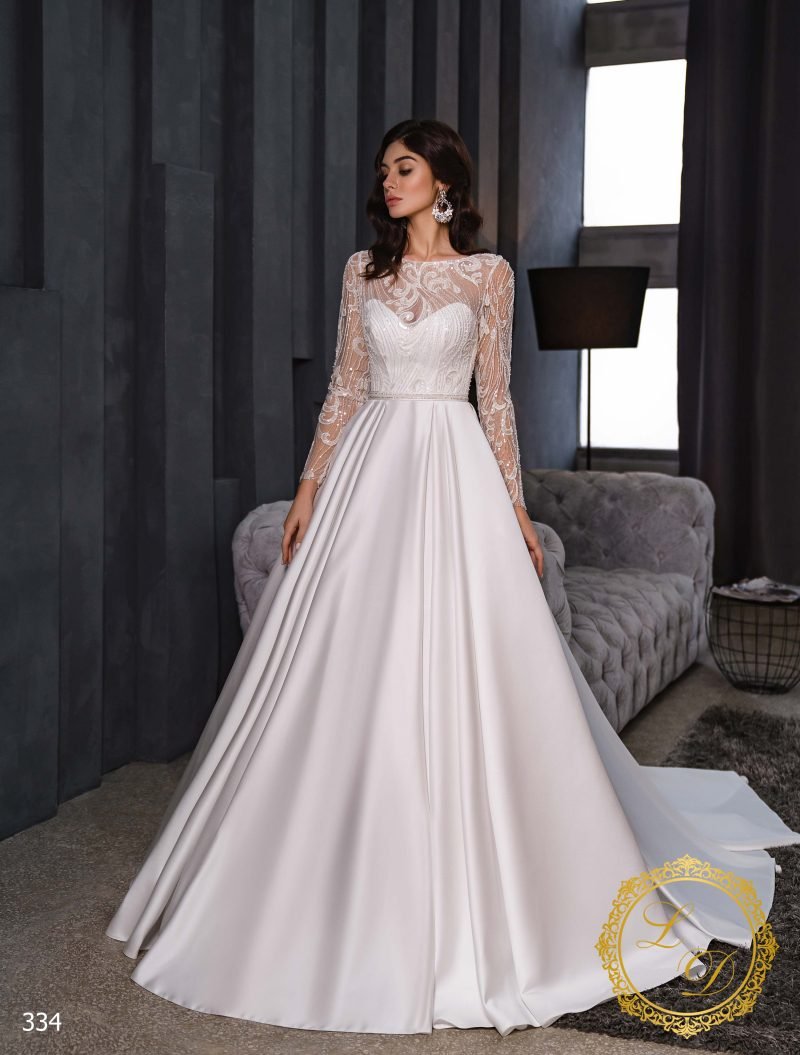 Robe De Mariée Princesse Bustier A Manches Longues Blanche